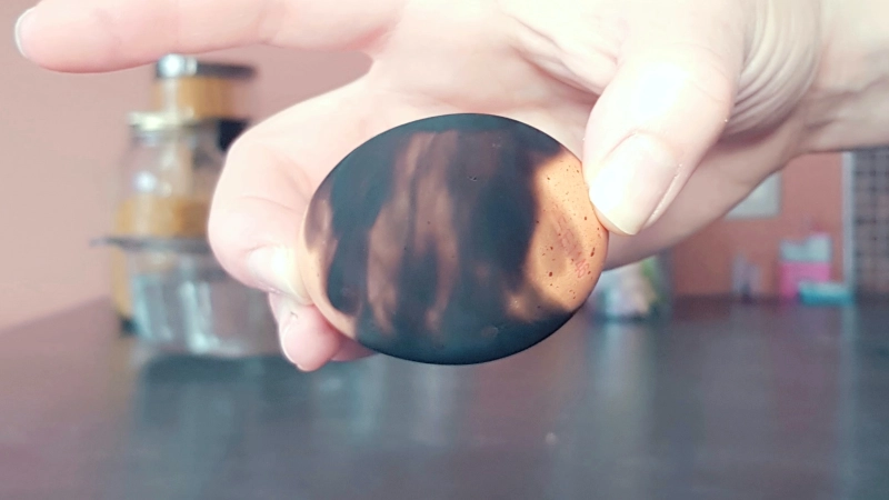 egg covered with soot