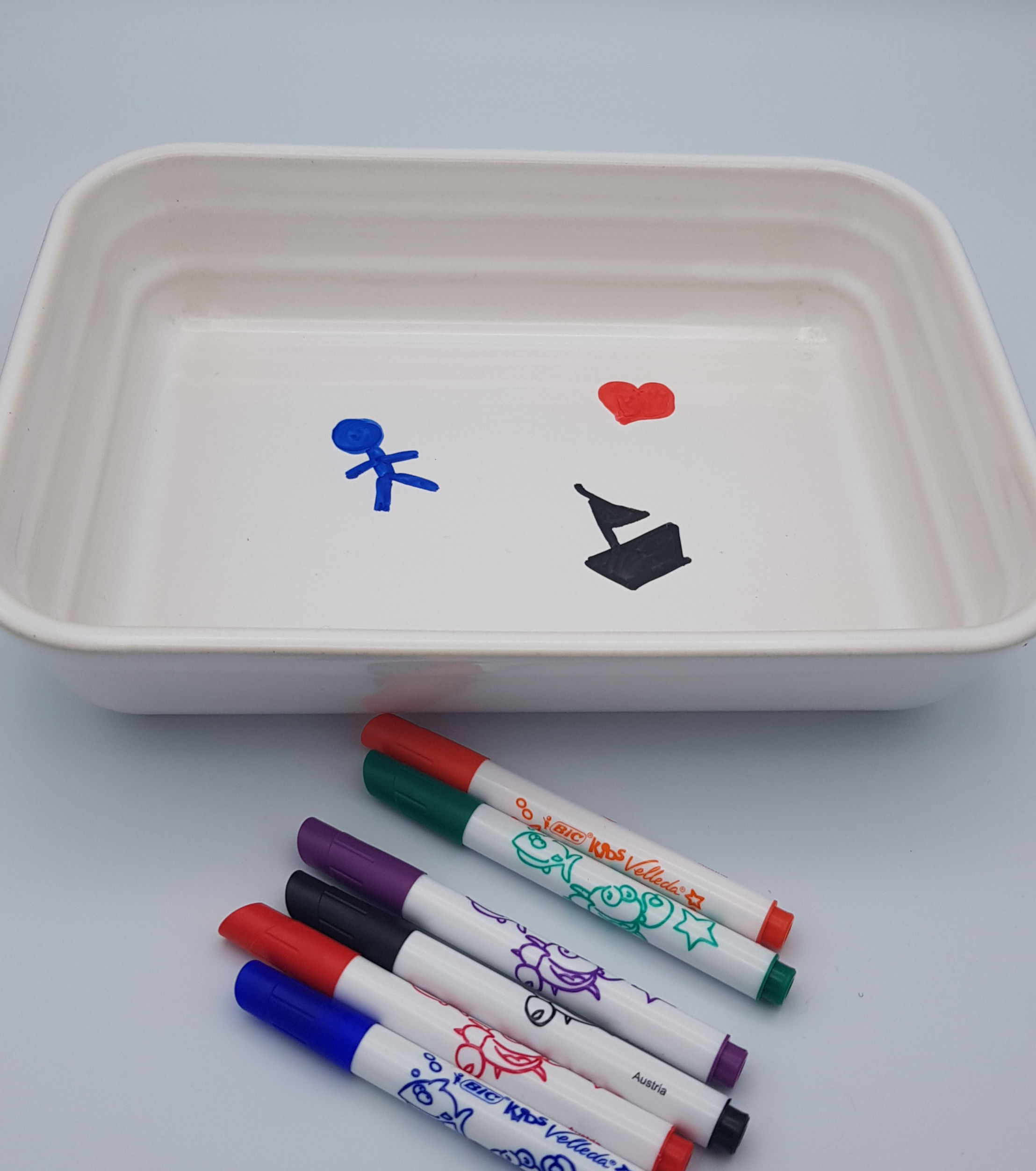 draw with a permanent marker in a dish