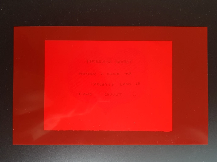 a decoded message with a red filter
